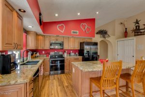 You will love the updated kitchen in the Palo Verde Golf course home.