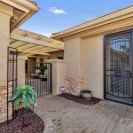 Welcome to the inviting courtyard at 24223 S Briar Wing Dr.