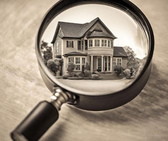 home under a magnify glass