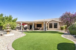 Enjoy a serene backyard at 10215 E Arrowvale Dr. 