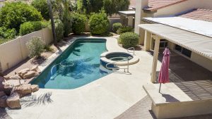 Enjoy the sparkling pool at 10913 E Flintlock.